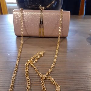 Small pink chain clutch
